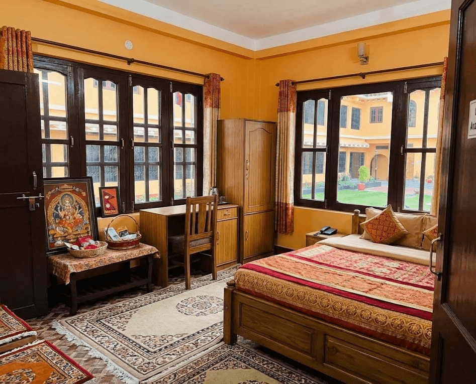 Private studios with kitchens, bathrooms, and meditation spaces