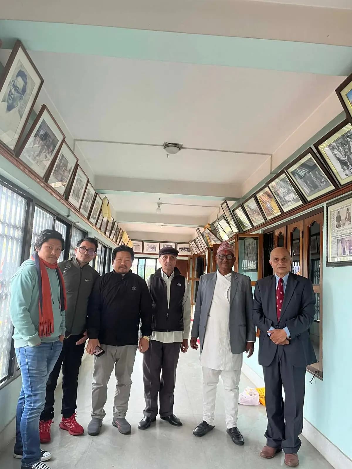 Museum gallery interior displaying historical photographs and documentation